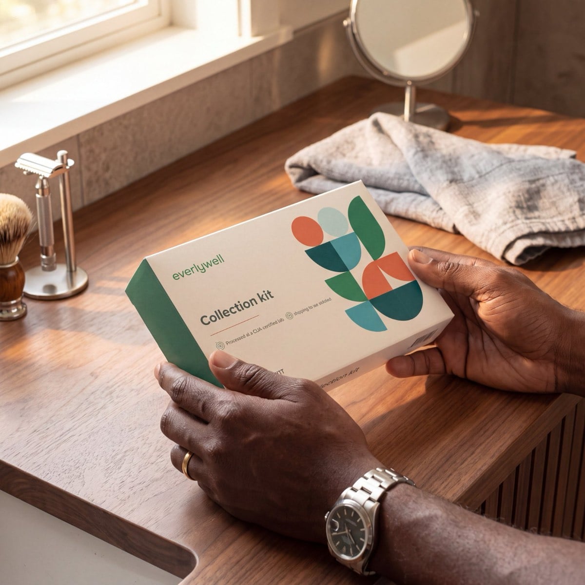 The Men's Health Test kit in hand at home
